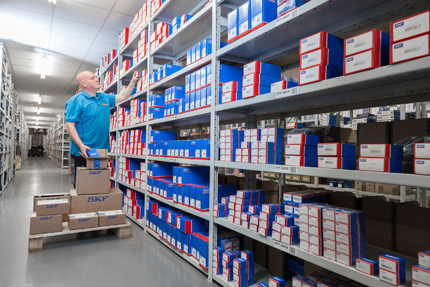 Man selecting maintenance products in Acorn warehouse