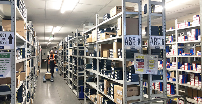 Man picking bearings in Acorn warehouse