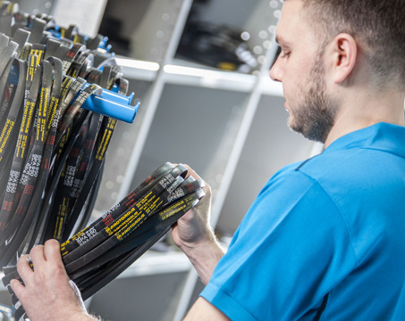 Man sorting belts