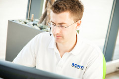 Bearing specialist talking on telephone