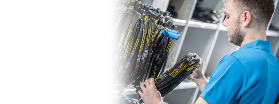 Warehouse team member picking belts
