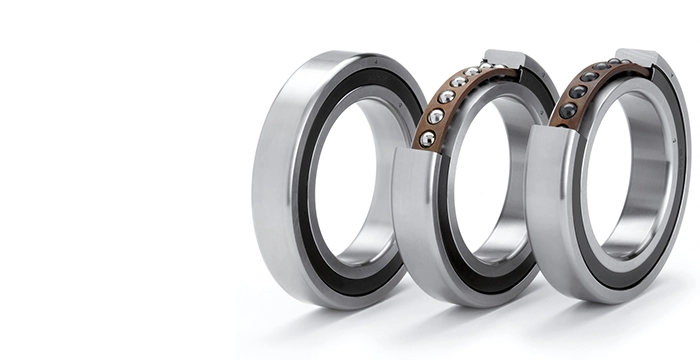 A range of precision bearings showing section cutaway showing ball bearings and cage designs
