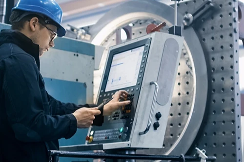 Man using a CNC machine