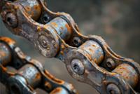 Incorrectly lubricated Industrial chain showing rust