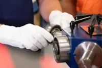 Image of a bearing being fitted onto a mounting star